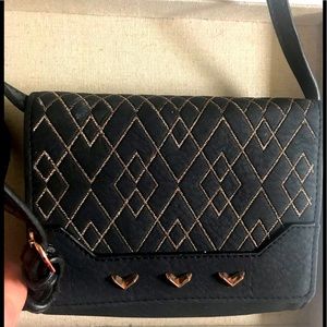 New in box Stella & Dot vegan cross body rose gold